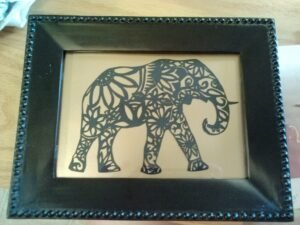 Silhouette Paper art piece showing an ornate elephant
